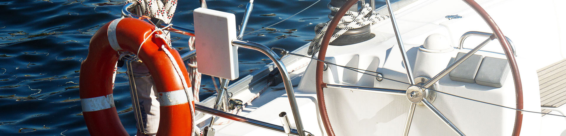closeup-beautiful-yacht-rudder-daylight-horizontal-sea-background-(1)-quer